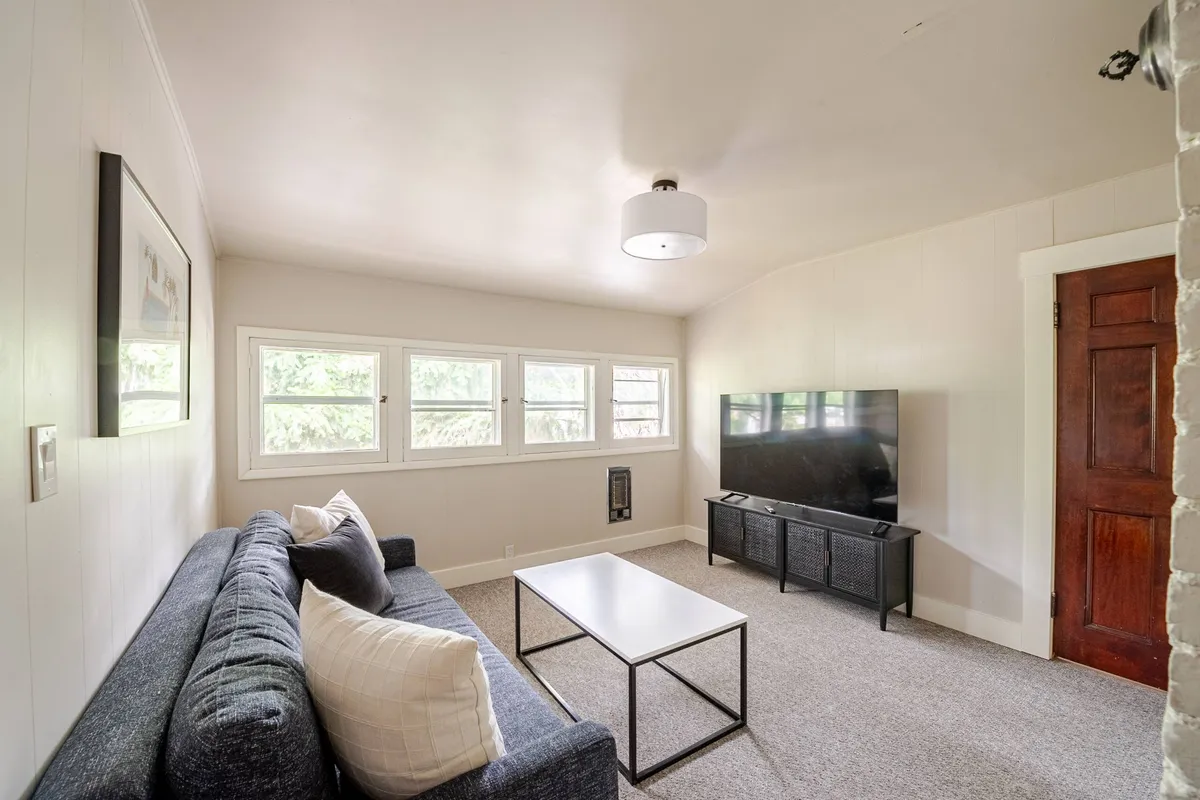 Upstairs second living room with 65-inch TV